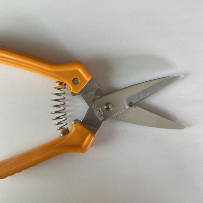 購入 エルゴノミクス オレンジ柄の多機能シザー オンライン製造